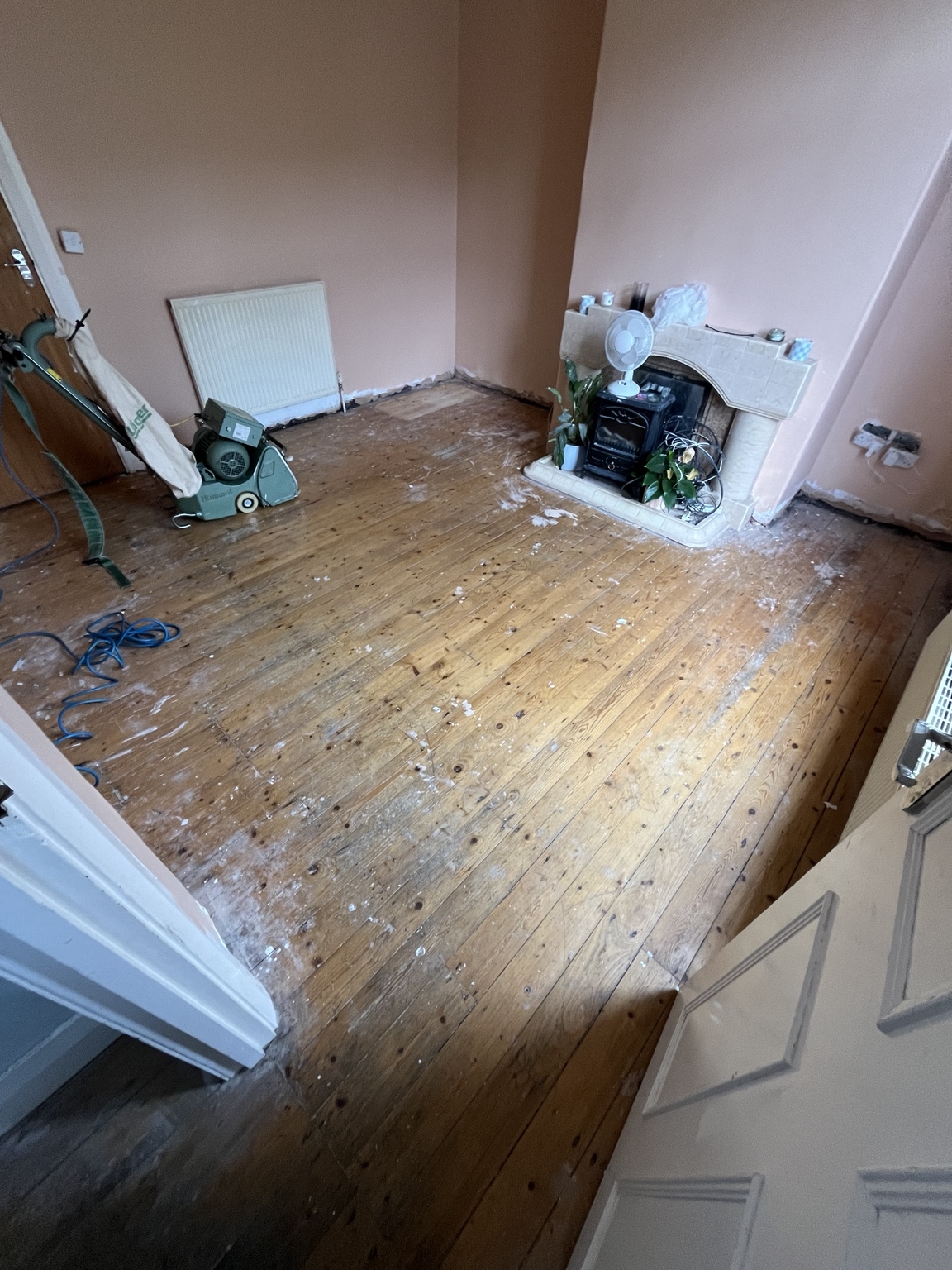 Josh from Precision Floor Care restoring a wooden floor