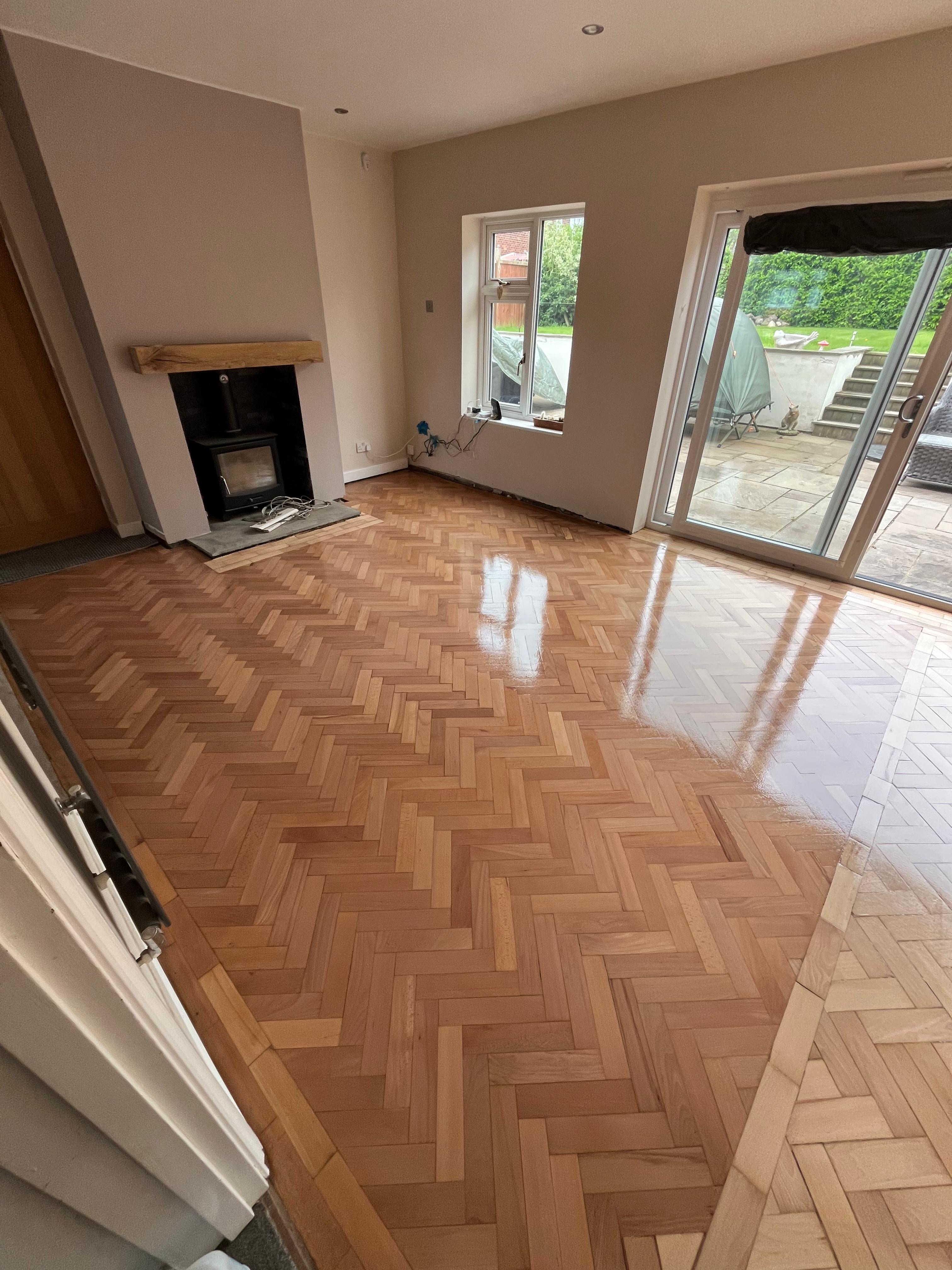 Premium herringbone parquet floor restoration project