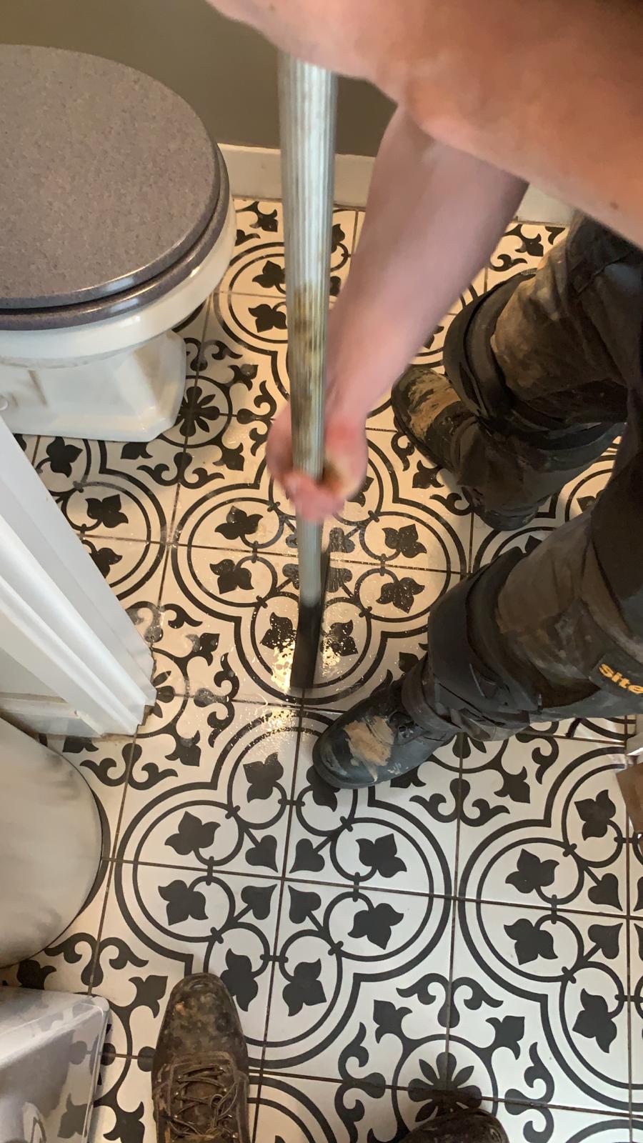 Patterned tile floor cleaning